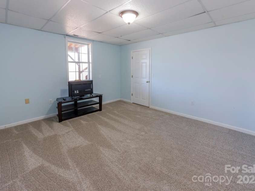 640 Laurel Heights Lane, Tryon, NC 28782.  MLS# CAR4212228, YatesRealty ID 7354. BR #4 Basement Level
