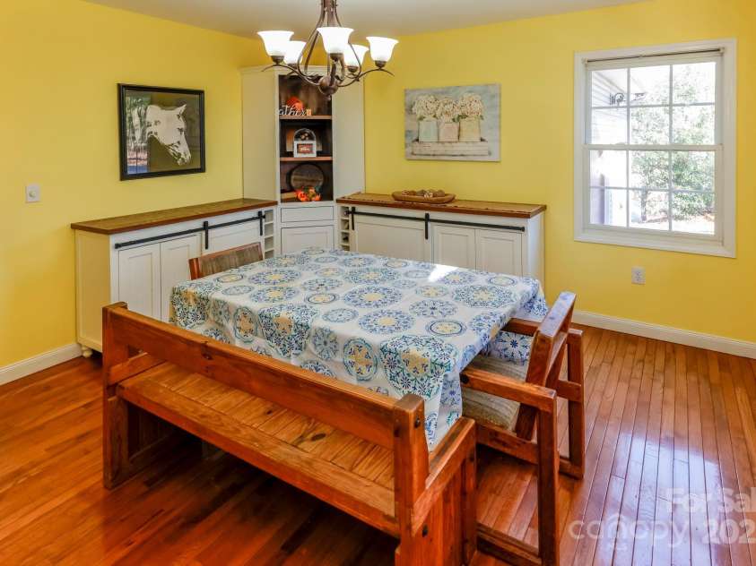 640 Laurel Heights Lane, Tryon, NC 28782.  MLS# CAR4212228, YatesRealty ID 7354. Built Farmhouse cabinetry in DR