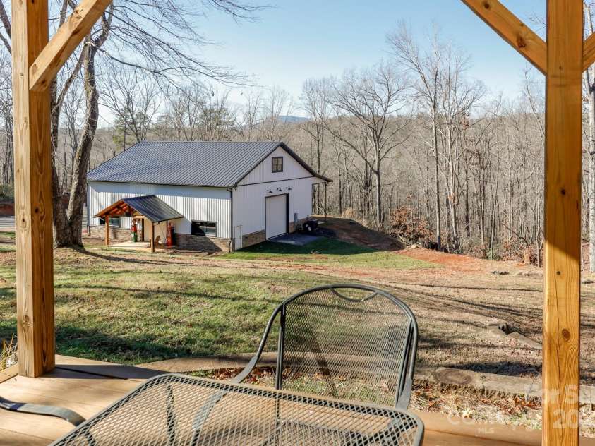 640 Laurel Heights Lane, Tryon, NC 28782.  MLS# CAR4212228, YatesRealty ID 7354. Covered porch off Basement Level