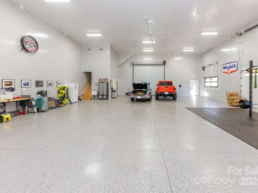640 Laurel Heights Lane, Tryon, NC 28782.  MLS# CAR4212228, YatesRealty ID 7354. Epoxy Floors throughout