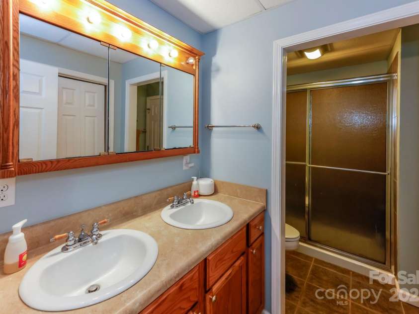 640 Laurel Heights Lane, Tryon, NC 28782.  MLS# CAR4212228, YatesRealty ID 7354. Full Bath Basement