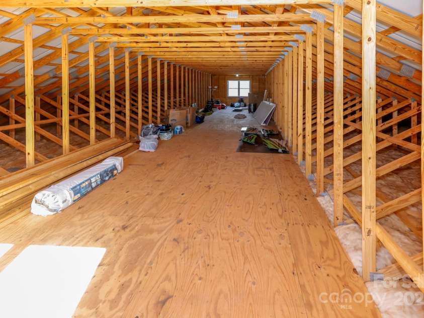 640 Laurel Heights Lane, Tryon, NC 28782.  MLS# CAR4212228, YatesRealty ID 7354. Full Length storage upstairs in Building