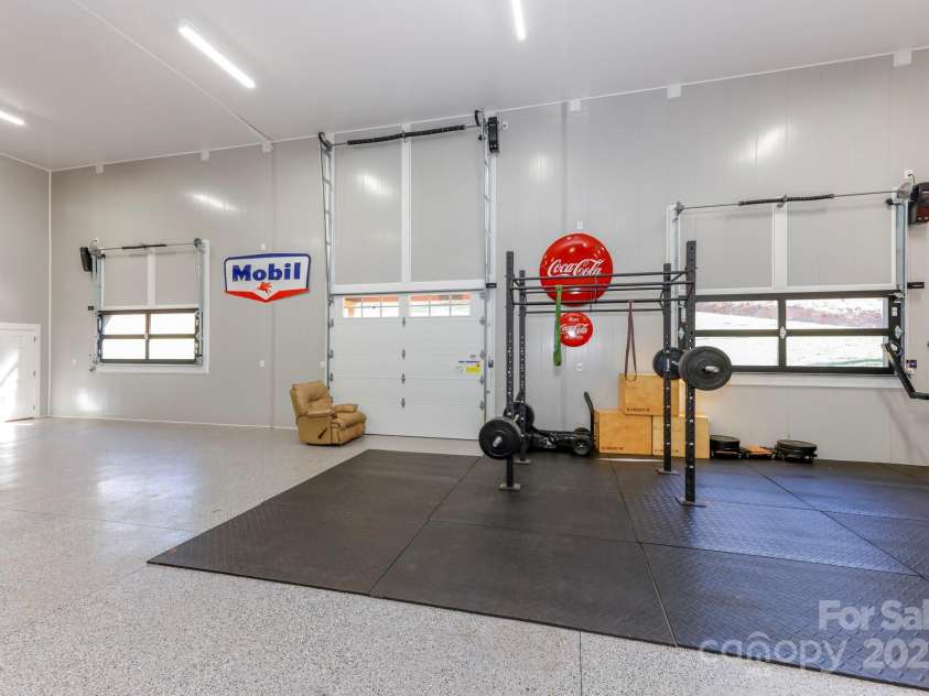 640 Laurel Heights Lane, Tryon, NC 28782.  MLS# CAR4212228, YatesRealty ID 7354. Gym Equipment does not convey