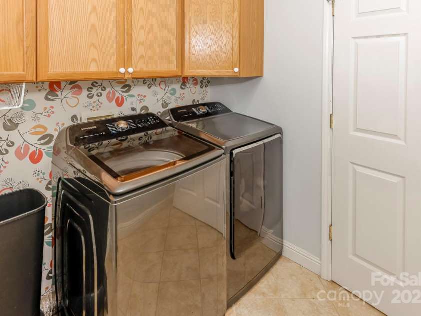 640 Laurel Heights Lane, Tryon, NC 28782.  MLS# CAR4212228, YatesRealty ID 7354. Laundry located off kitchen & garage entrance