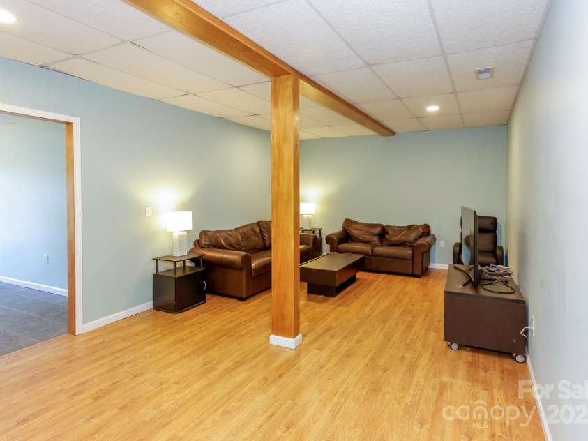 640 Laurel Heights Lane, Tryon, NC 28782.  MLS# CAR4212228, YatesRealty ID 7354. LR Area Basement