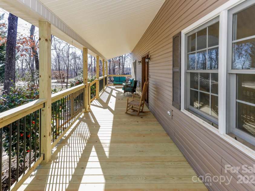 640 Laurel Heights Lane, Tryon, NC 28782.  MLS# CAR4212228, YatesRealty ID 7354. New Rocking Chair Front Porch