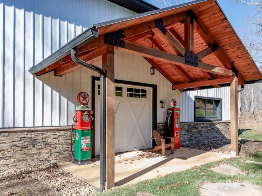 640 Laurel Heights Lane, Tryon, NC 28782.  MLS# CAR4212228, YatesRealty ID 7354. Porch on side of building