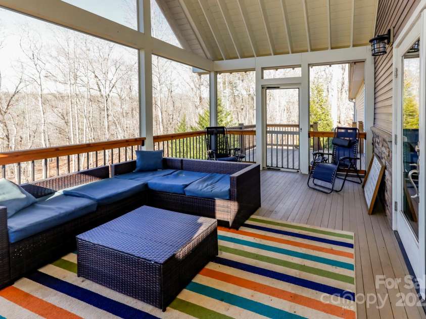 640 Laurel Heights Lane, Tryon, NC 28782.  MLS# CAR4212228, YatesRealty ID 7354. Screeend in Porch off Living Room