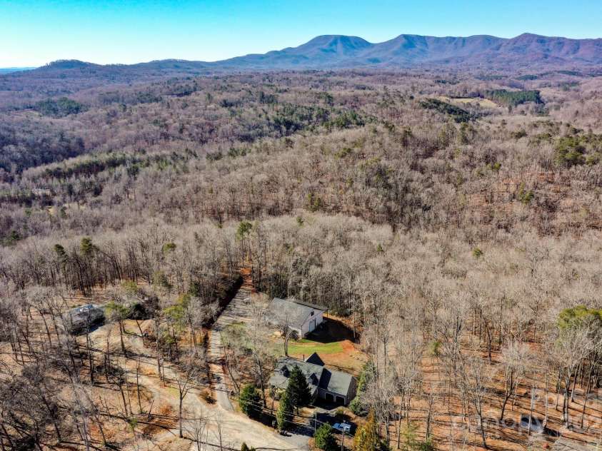 640 Laurel Heights Lane, Tryon, NC 28782.  MLS# CAR4212228, YatesRealty ID 7354. Seasonal View of Mountain Range