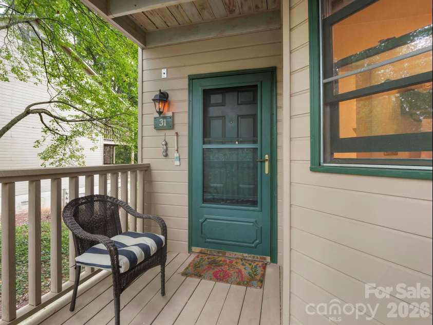 160 Whitney Boulevard, Lake Lure, NC 28746.  MLS# CAR4364801, YatesRealty ID 736. Lower level end unit