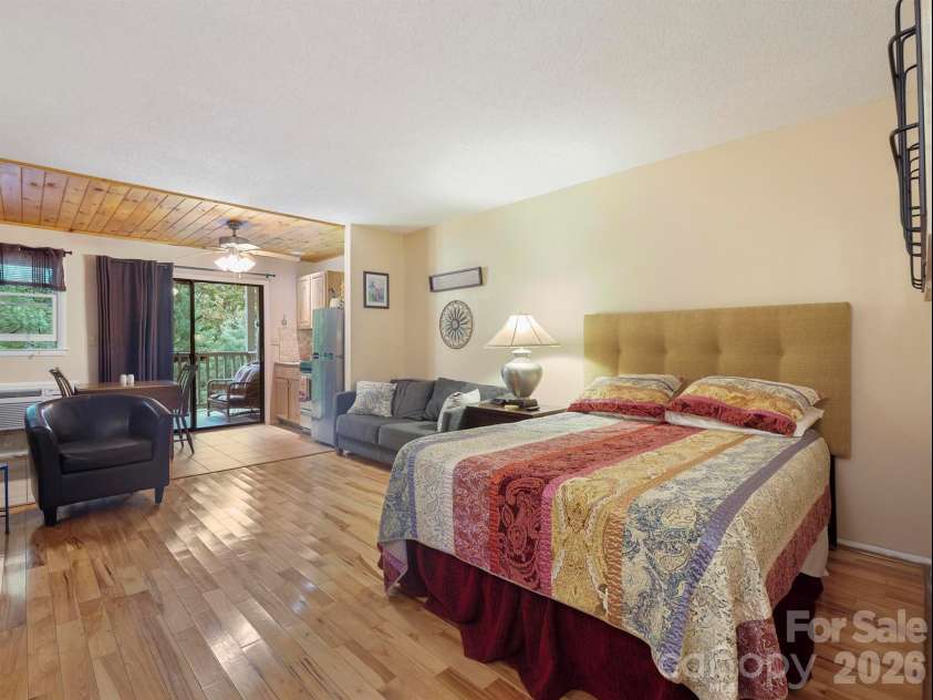 160 Whitney Boulevard, Lake Lure, NC 28746.  MLS# CAR4364801, YatesRealty ID 736. Queen size bed