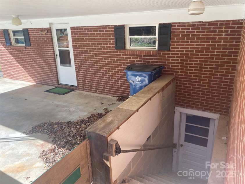 1773 Carlton Drive, Lenoir, NC 28645.  MLS# CAR4231289, YatesRealty ID 7360. Exterior Entry Basement