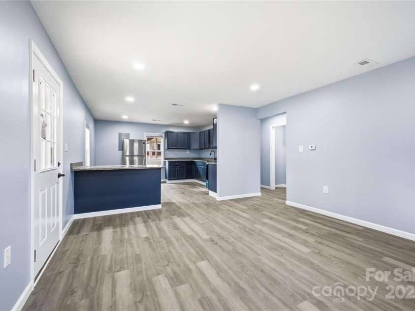 349 Gorman Bridge Road, Asheville, NC 28806.  MLS# CAR4330803, YatesRealty ID 737. Family Room (Kitchen View)