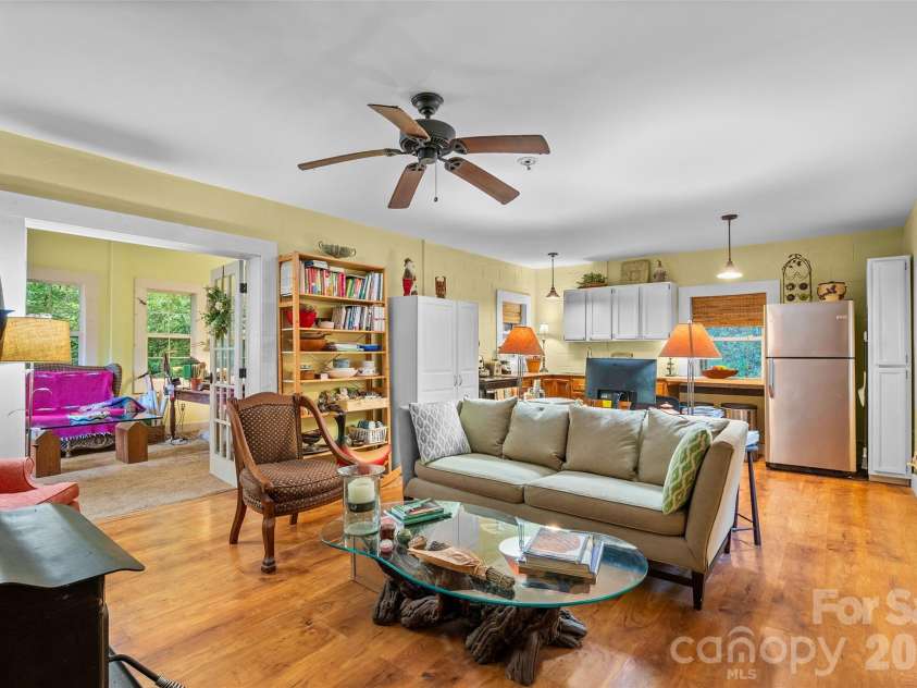 1087 Turkey Creek Road, Leicester, NC 28748.  MLS# CAR4358676, YatesRealty ID 7371. Open flow living room and kitchen