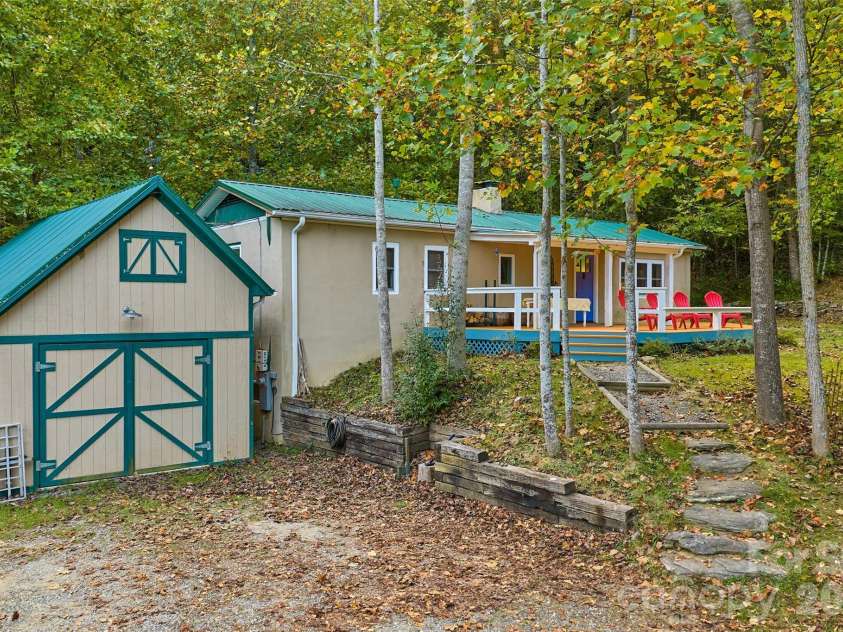 1087 Turkey Creek Road, Leicester, NC 28748.  MLS# CAR4358676, YatesRealty ID 7371. Property includes a spacious garage/workshop/storage building 