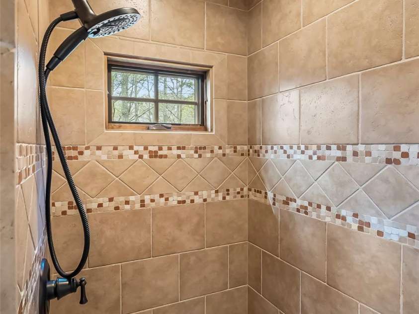 4064 Dense Acre Trail, Nebo, NC 28761.  MLS# CAR4301277, YatesRealty ID 7377. Large walk-in shower