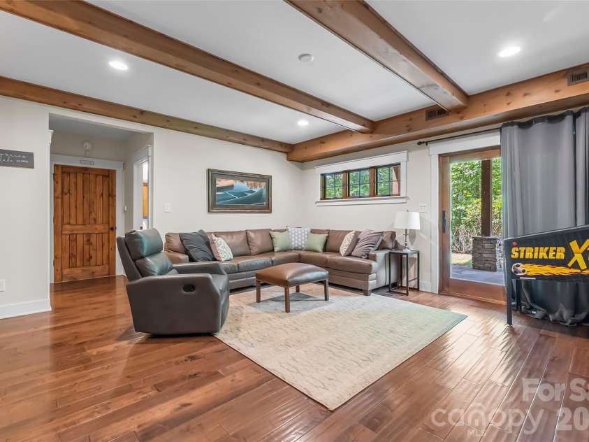4064 Dense Acre Trail, Nebo, NC 28761.  MLS# CAR4301277, YatesRealty ID 7377. Lower level family room