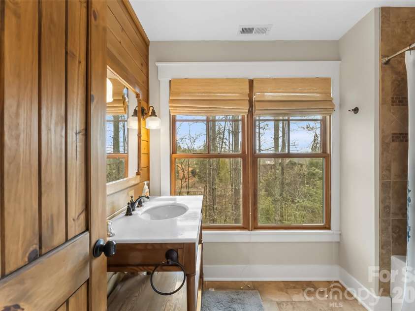 4064 Dense Acre Trail, Nebo, NC 28761.  MLS# CAR4301277, YatesRealty ID 7377. Upper full bathroom