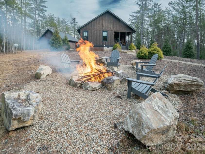 2004 Fergusons Folly Drive, Nebo, NC 28761.  MLS# CAR4349625, YatesRealty ID 7379. Fire pit