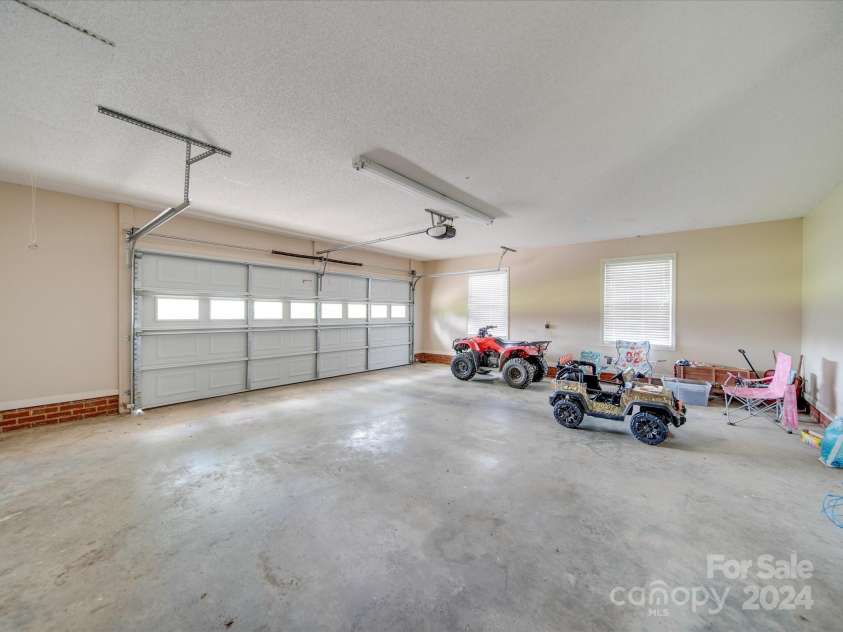 8510 Olive Branch Road, Marshville, NC 28103.  MLS# CAR4189681, YatesRealty ID 738. Attached garage