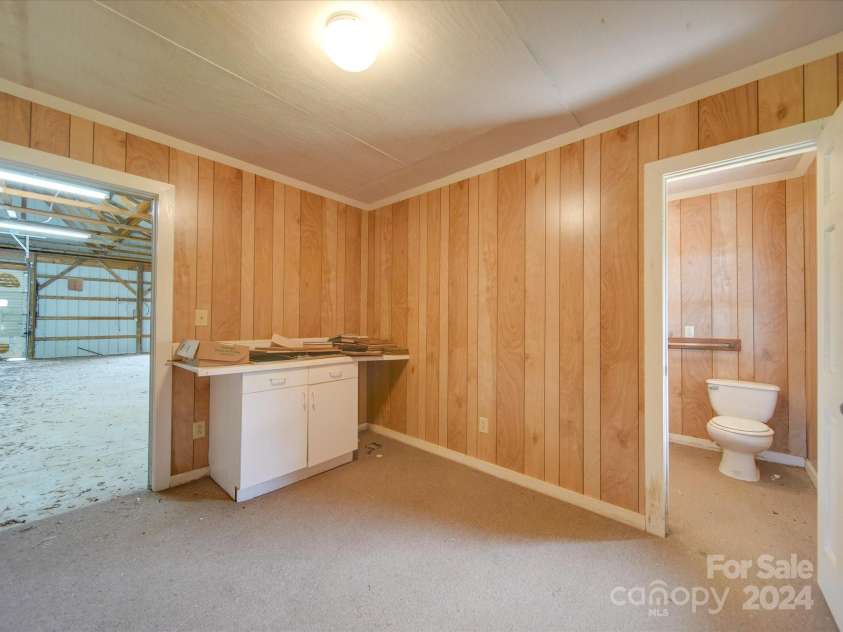 8510 Olive Branch Road, Marshville, NC 28103.  MLS# CAR4189681, YatesRealty ID 738. Finished area/ bath inside shop.