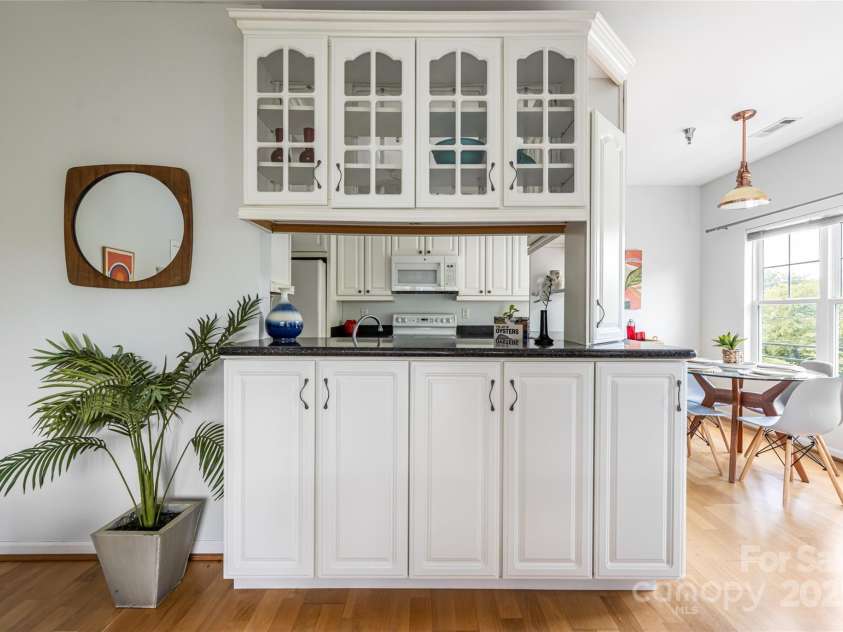 64 Clingman Avenue, Asheville, NC 28801.  MLS# CAR4285759, YatesRealty ID 7381. Ample cabinetary for storage