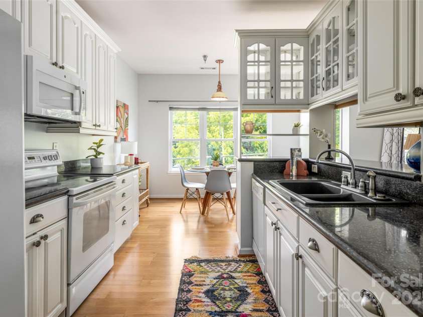 64 Clingman Avenue, Asheville, NC 28801.  MLS# CAR4285759, YatesRealty ID 7381. Galley kitchen with tons of countertop space