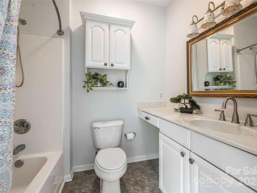 64 Clingman Avenue, Asheville, NC 28801.  MLS# CAR4285759, YatesRealty ID 7381. Primary bathroom