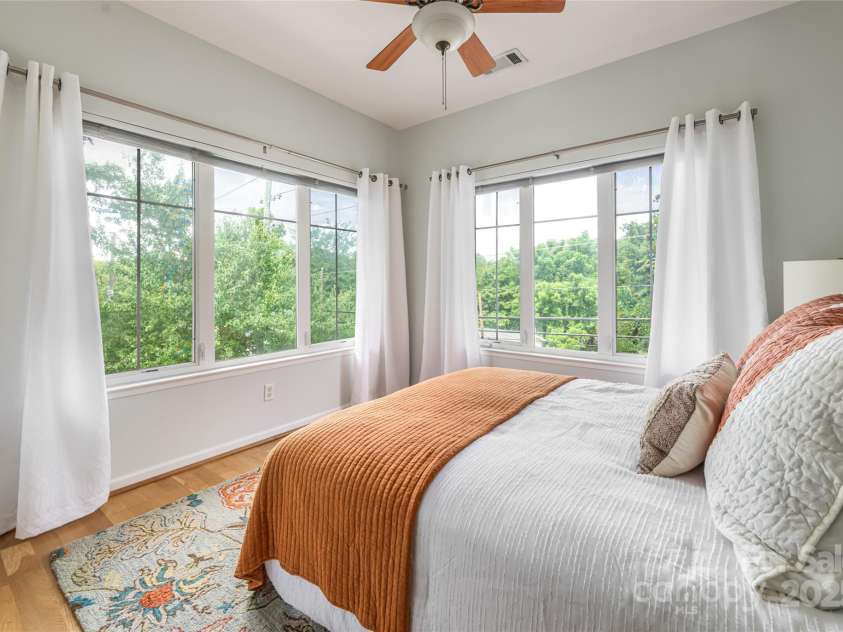 64 Clingman Avenue, Asheville, NC 28801.  MLS# CAR4285759, YatesRealty ID 7381. Tons of windows allow the light to flood inside