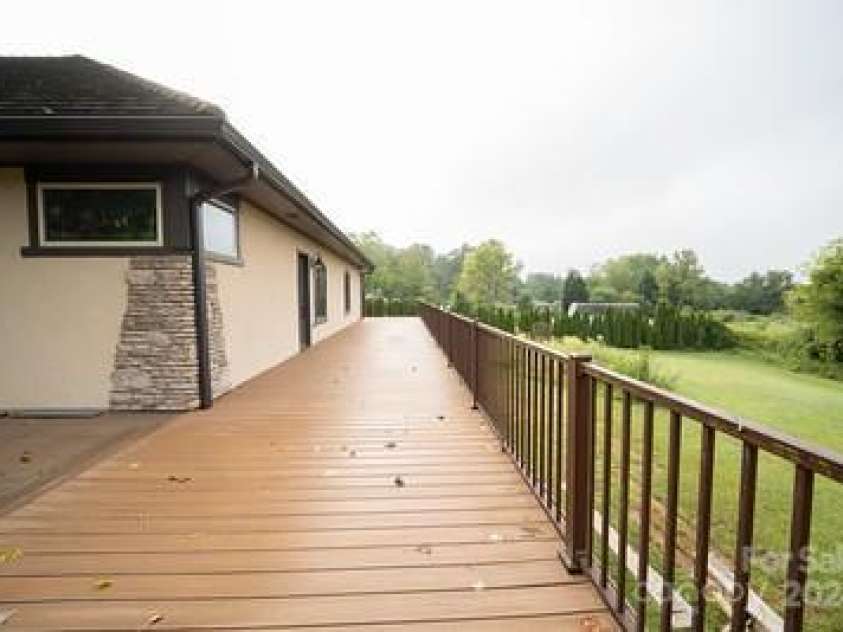 110 Glenwood Lane, Hendersonville, NC 28792.  MLS# CAR4177654, YatesRealty ID 7388. Back deck