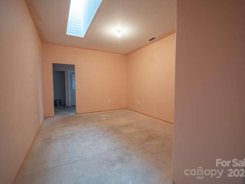 110 Glenwood Lane, Hendersonville, NC 28792.  MLS# CAR4177654, YatesRealty ID 7388. Media room with skylight