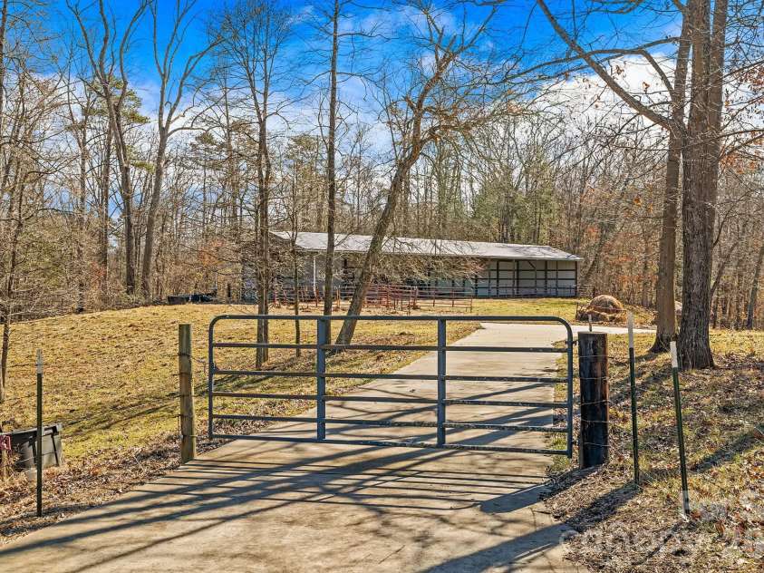 735 Macedonia Road, Asheville, NC 28804.  MLS# CAR4345434, YatesRealty ID 7392. Gate to Additional Structures 