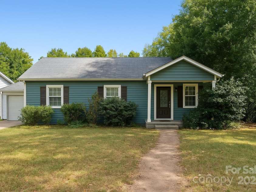 827 Drummond Avenue, Charlotte, NC 28205.  MLS# CAR4312794, YatesRealty ID 740. AI Generated Exterior with landscaping complete