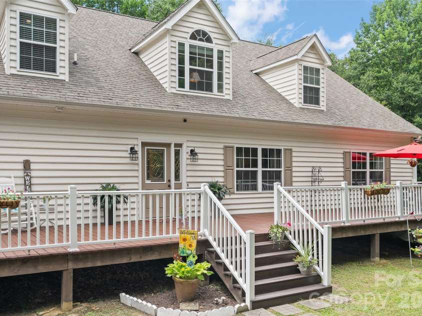 165 Sequoyah Drive, Waynesville, NC 28785.  MLS# CAR4396850, YatesRealty ID 7402. Front deck with new stain.
