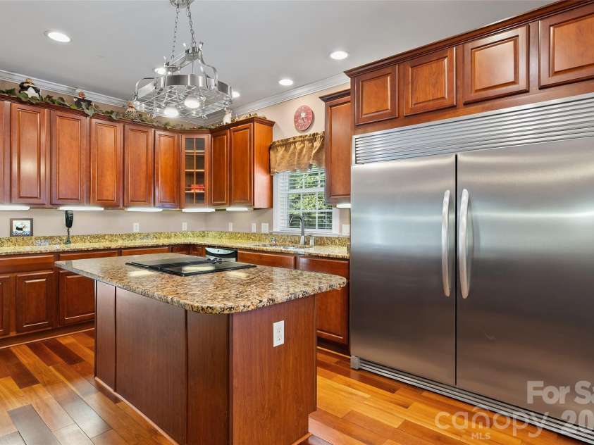 165 Sequoyah Drive, Waynesville, NC 28785.  MLS# CAR4396850, YatesRealty ID 7402. Kitchen with enormous refrigerator