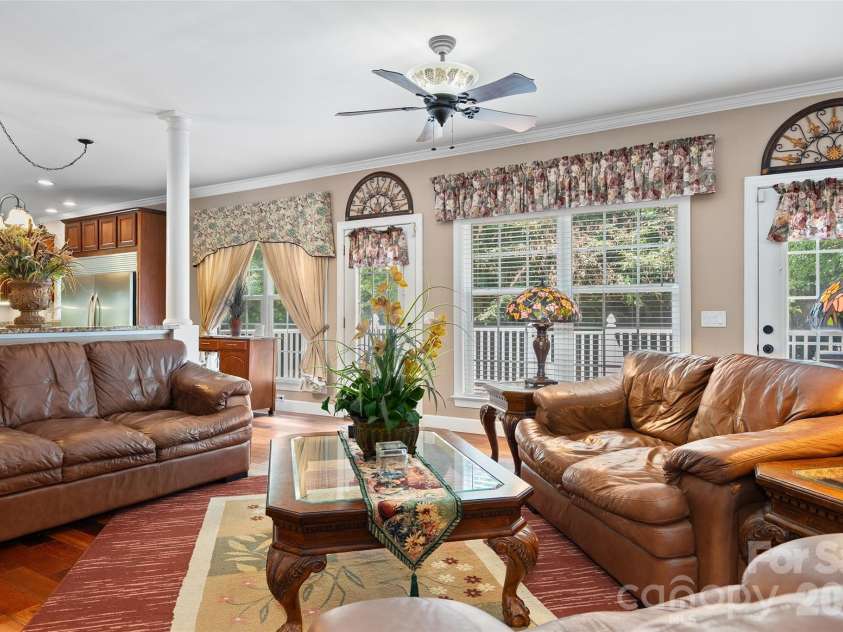 165 Sequoyah Drive, Waynesville, NC 28785.  MLS# CAR4396850, YatesRealty ID 7402. Living room with walkout deck