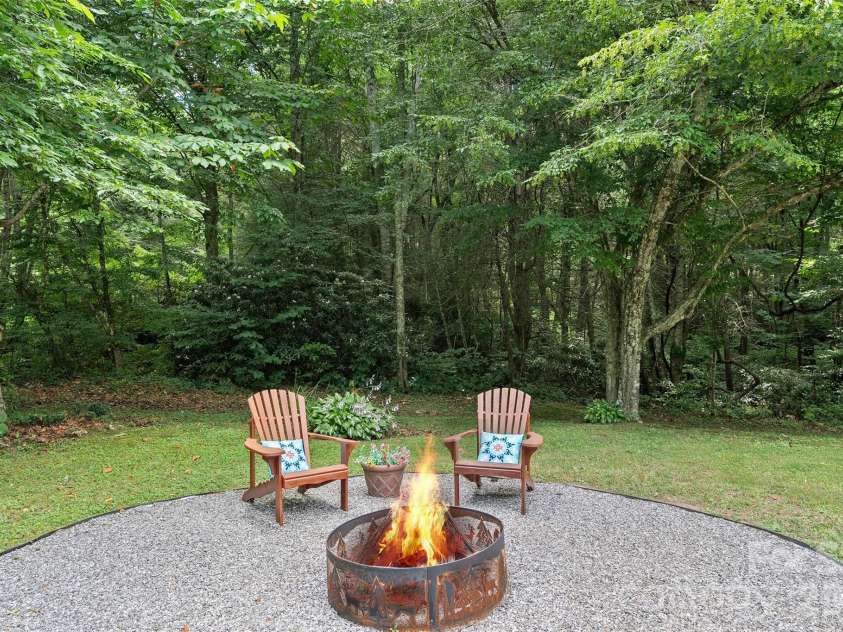 165 Sequoyah Drive, Waynesville, NC 28785.  MLS# CAR4396850, YatesRealty ID 7402. Outdoor fireplace