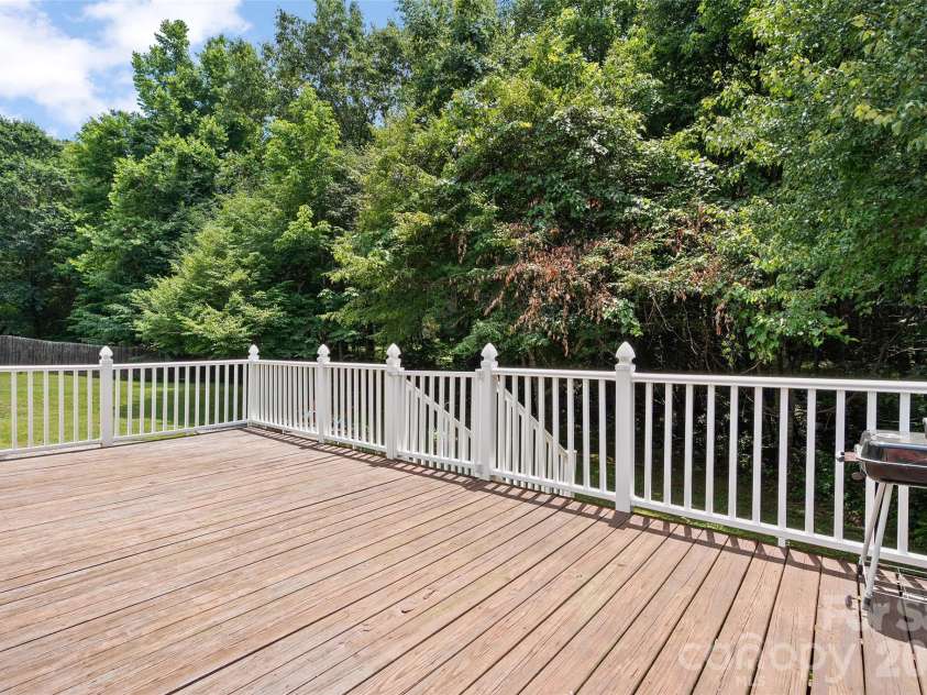 165 Sequoyah Drive, Waynesville, NC 28785.  MLS# CAR4396850, YatesRealty ID 7402. Spacious back deck