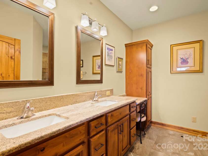 520 Penny Lane, Banner Elk, NC 28604.  MLS# CAR4244171, YatesRealty ID 7402. Double Vanity in Primary Ensuite