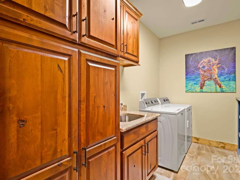 520 Penny Lane, Banner Elk, NC 28604.  MLS# CAR4244171, YatesRealty ID 7402. Laundry Room with Cabinets