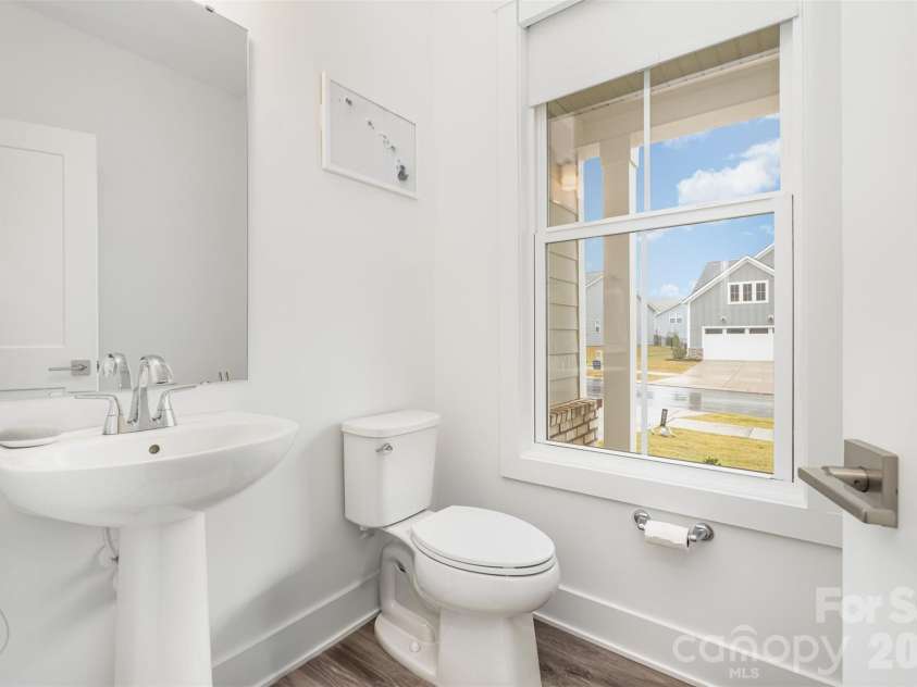 5216 Mint Harbor Way, Charlotte, NC 28269.  MLS# CAR4316519, YatesRealty ID 7403. First floor half bath