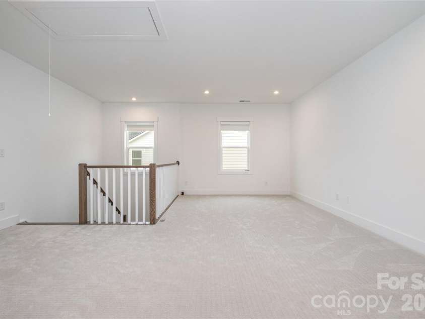 5216 Mint Harbor Way, Charlotte, NC 28269.  MLS# CAR4316519, YatesRealty ID 7403. Huge loft