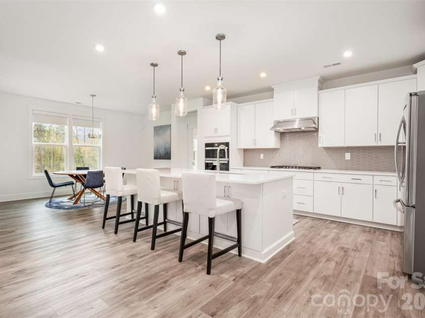 5216 Mint Harbor Way, Charlotte, NC 28269.  MLS# CAR4316519, YatesRealty ID 7403. Oversized kitchen island
