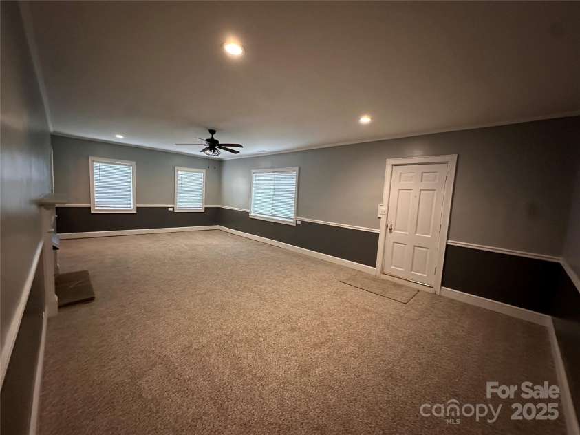 131 Glendale Avenue, Concord, NC 28025.  MLS# CAR4190131, YatesRealty ID 7408. Living Room Main Door Closed