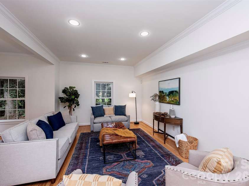939 Linda Lane, Charlotte, NC 28211.  MLS# CAR4360605, YatesRealty ID 7408. Great gathering lounge seating in basement 