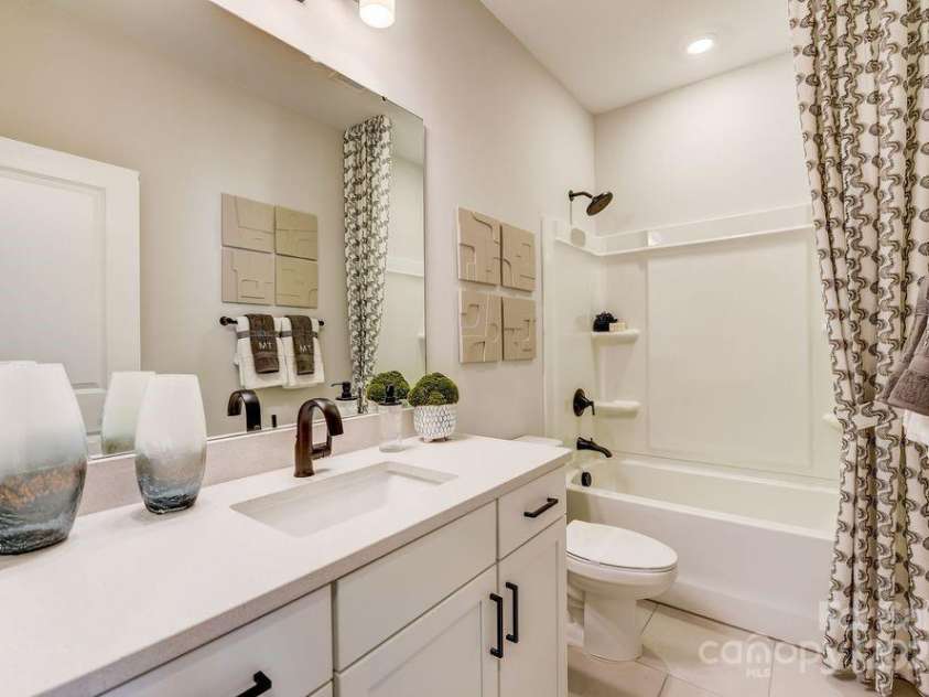 334 Catawba Avenue, Davidson, NC 28036.  MLS# CAR4250144, YatesRealty ID 7411. REPRESENTATIVE PHOTO