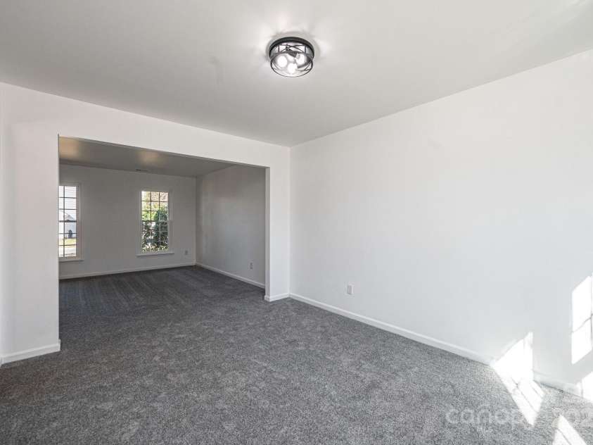 102 Brewster Court, Mooresville, NC 28115.  MLS# CAR4223330, YatesRealty ID 7417. Dining Room - Den