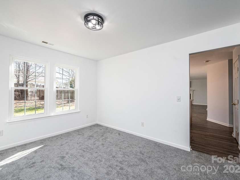 102 Brewster Court, Mooresville, NC 28115.  MLS# CAR4223330, YatesRealty ID 7417. Dining Room leading to the kitchen