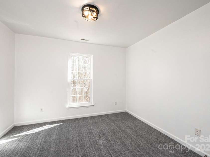 102 Brewster Court, Mooresville, NC 28115.  MLS# CAR4223330, YatesRealty ID 7417. Guest room