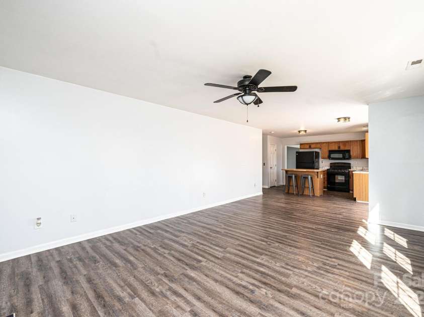 102 Brewster Court, Mooresville, NC 28115.  MLS# CAR4223330, YatesRealty ID 7417. Living Room - Kitchen